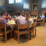 Guests seated around a table